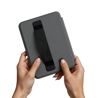 Gray kindle case with black strap held by hands on a white background