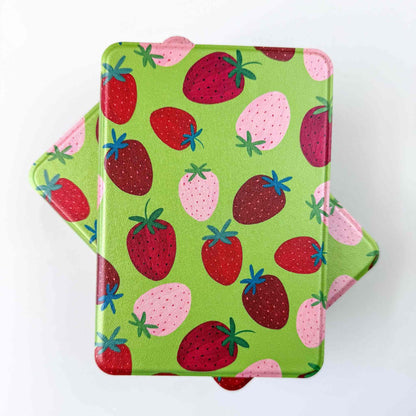 Two green kindle cases with strawberry pattern on a white background