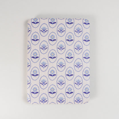 Bloom Service Kindle Case with repeating blue floral pattern and framed flower design on beige background by Elco House